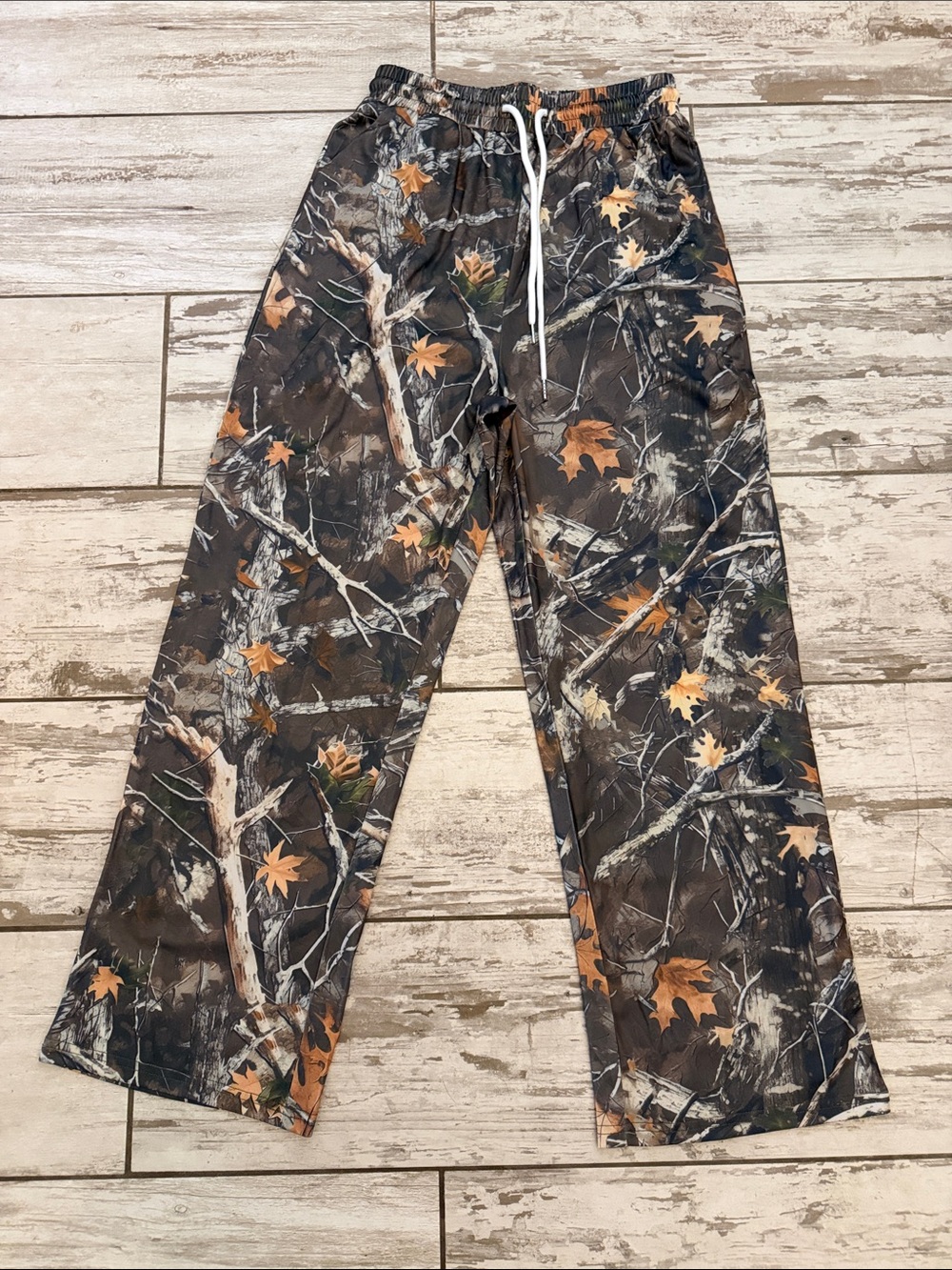 Brand new, women's camo sweat pants